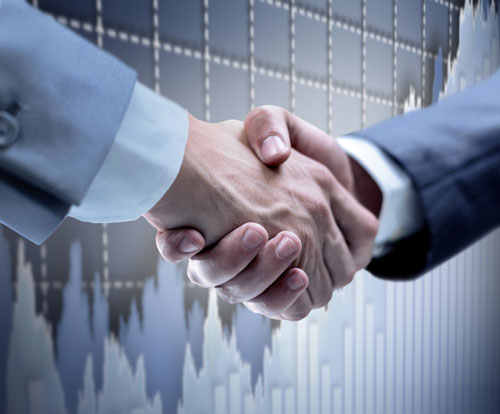 A handshake with a background of a metric chart in an upward trajectory